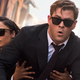 A crop from EW’s new cover story—Agent M holding Agent H for dear life.